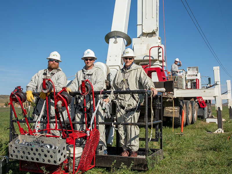 lineworkers at live line training