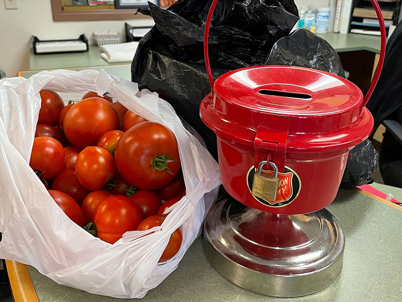tomatoes and Salvation Army kettle