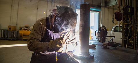 Man welding in shop