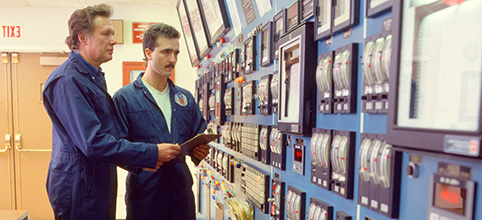 two men working in a historical photo