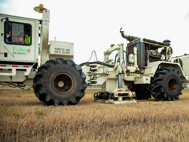 Vibroseis trucks on site at Dakota Gas